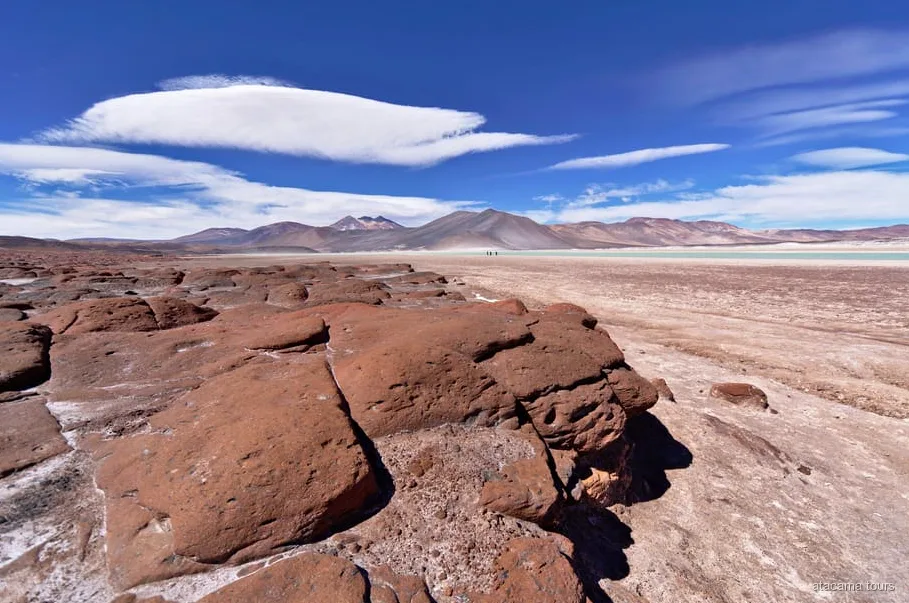Piedras Rojas and Altiplanic Lagoons tour, red volcanic rock over the salt flat